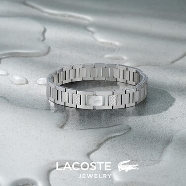 Спортивний браслет Lacoste Metropole сріблястого кольору з візерунком petit piqué та застібкою-затискачем, унісекс