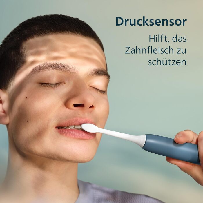 Електрична звукова зубна щітка Philips Sonicare Series 3100 з датчиком тиску, 3 режимами інтенсивності та дорожнім футляром, темно-синя, HX4033/26 (2 насадки)