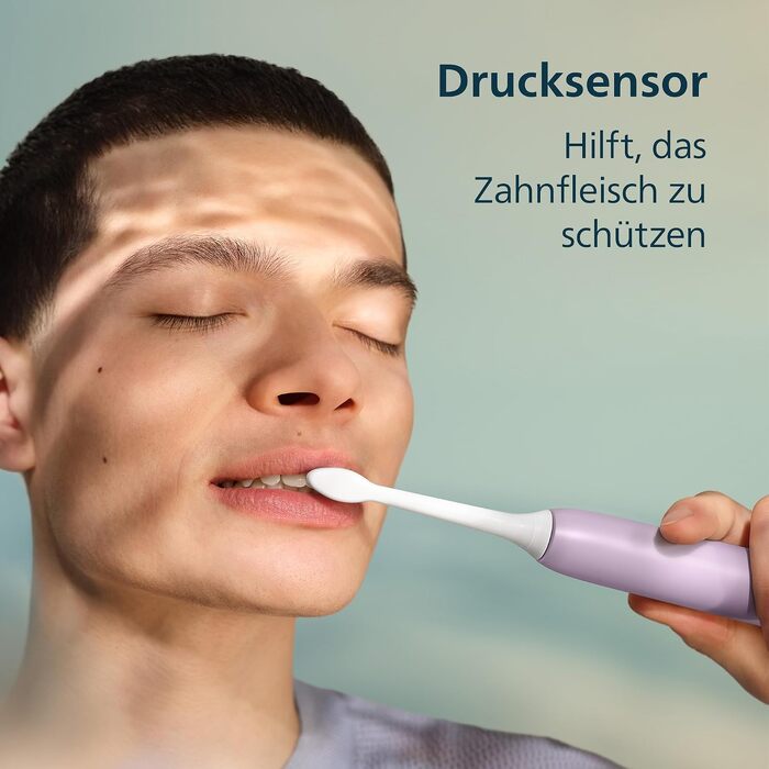 Електрична сонічна зубна щітка Philips Sonicare Series 4100 з датчиком тиску, 4 режимами чищення та дорожнім футляром, HX4044/52, Фіолетова